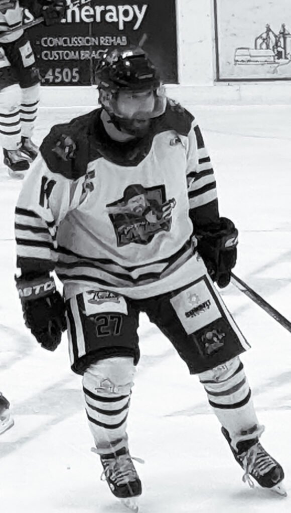 Coach Brendan McIntyre