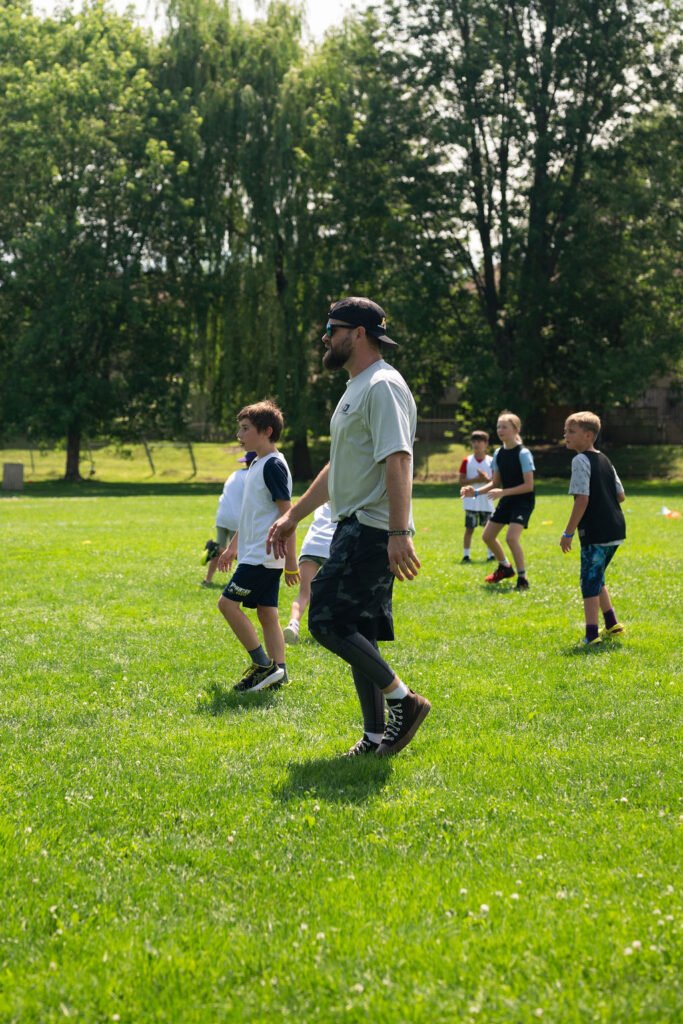 Coach Chris demonstrating skating mechanics